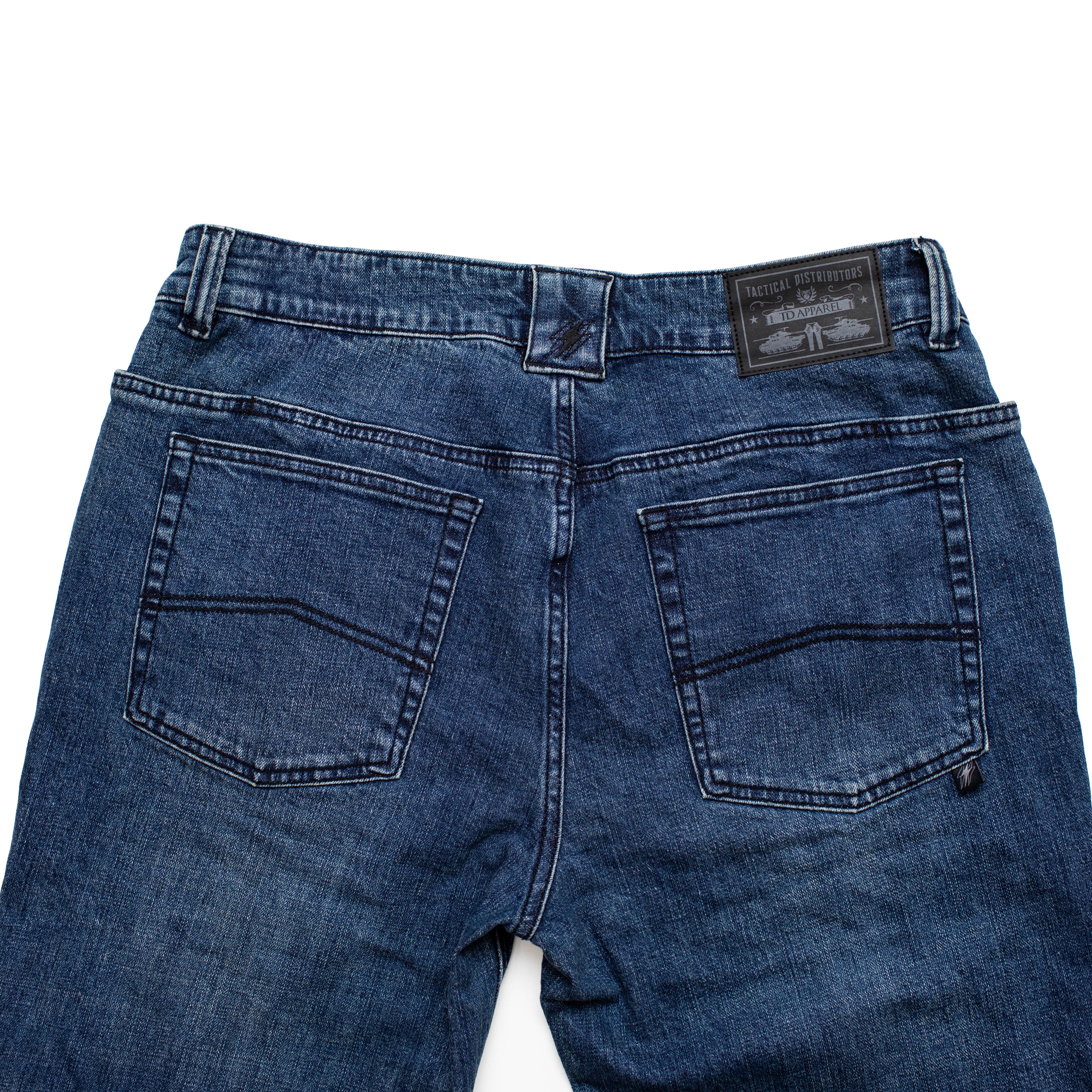 Back pocket view of the TD McQuade Tactical Jeans in the Mid Blue Marlboro wash showing the reinforced rear pockets, AR mag compatible EDC yoke pockets, and tactical denim construction designed for concealed carry users and those searching for the best tactical jeans and everyday carry pants.