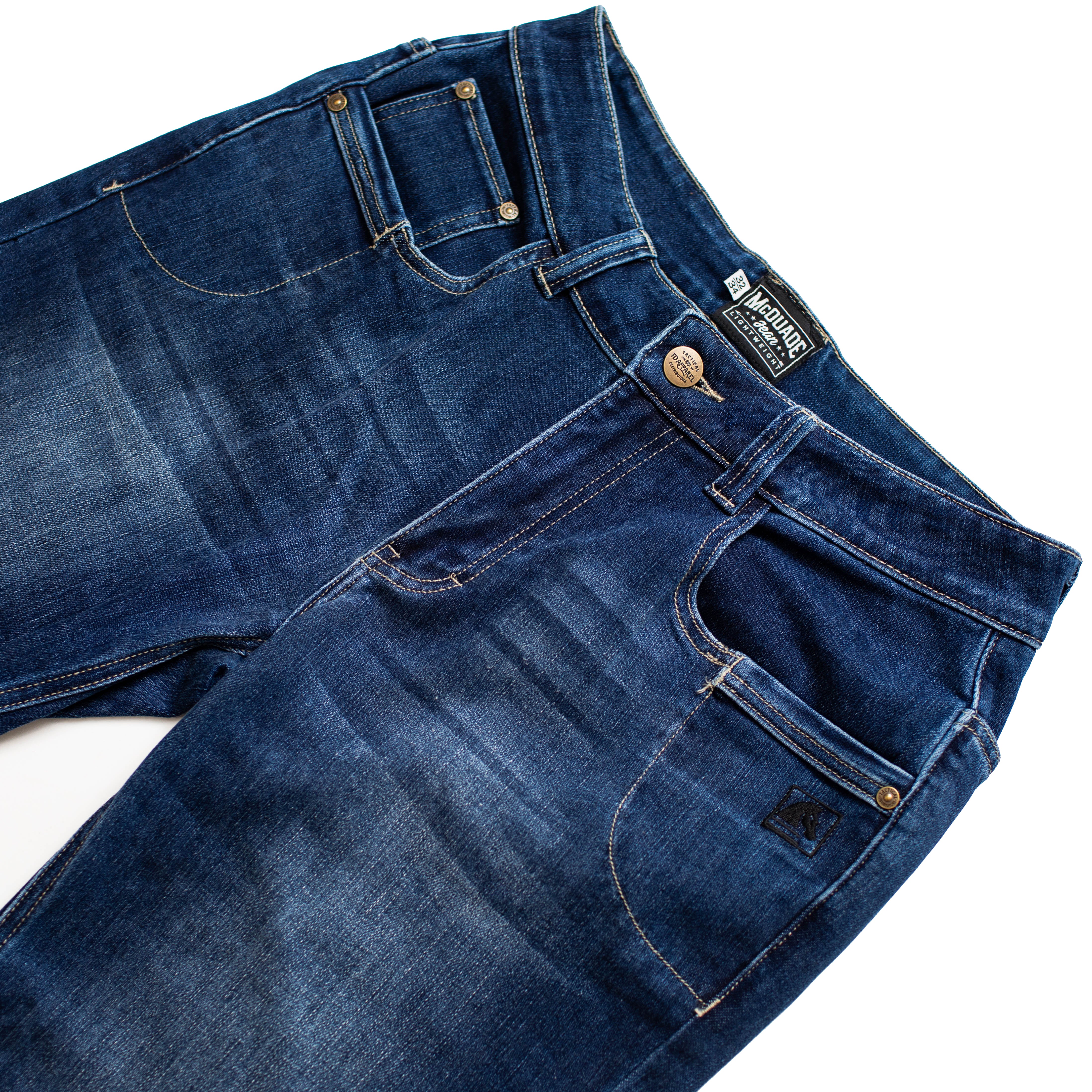 Front pocket layout of the TD McQuade Tactical Jeans in the Vintage wash showing the reinforced stitching, discreet EDC pocket design, knife pocket access, and concealed carry optimized tactical denim for users searching for the best tactical jeans, CCW pants, and everyday carry denim.