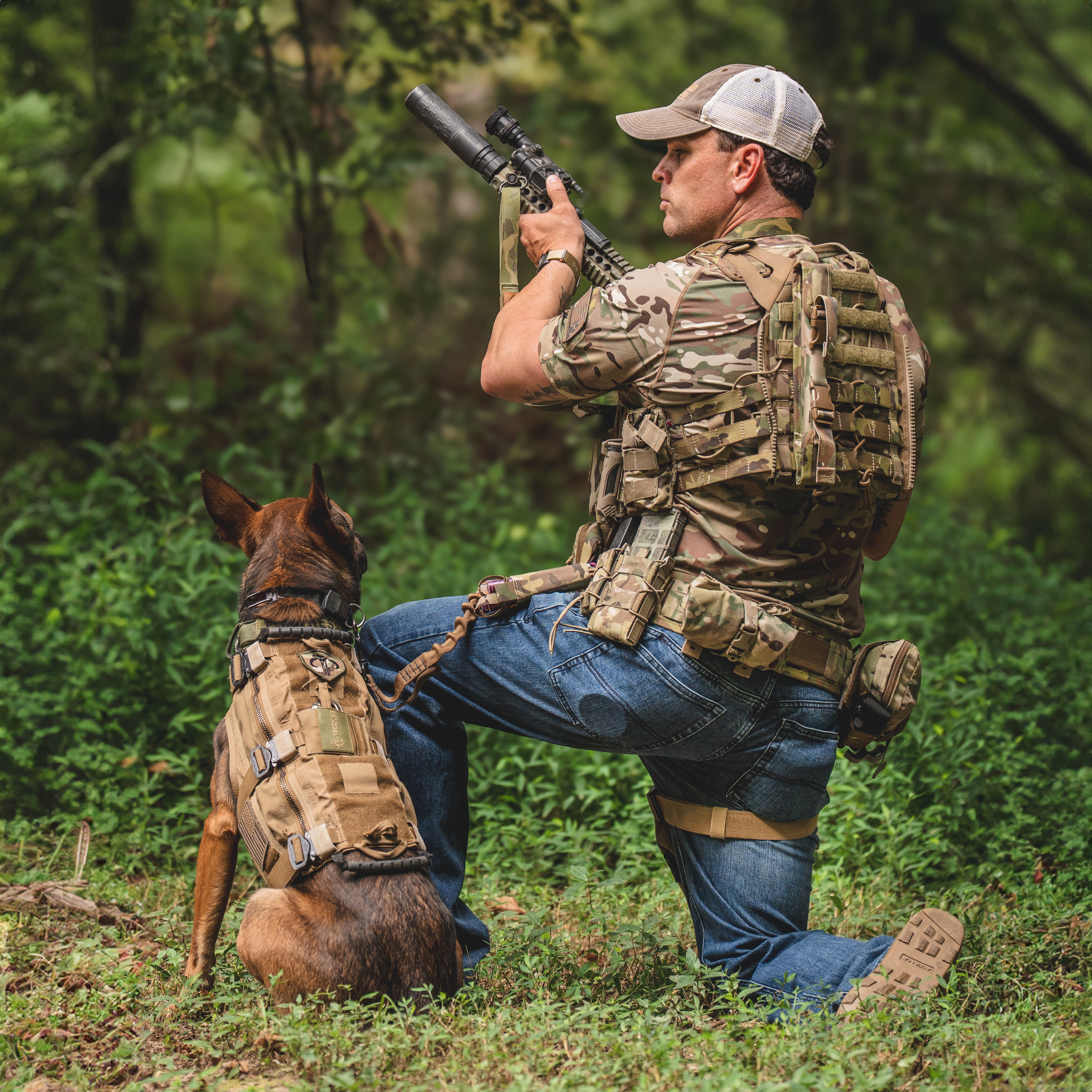 TD McQuade Tactical Jeans being used in a full tactical loadout showing the reinforced stretch denim, ten pocket EDC layout, concealed carry friendly design, and AR mag compatible pockets for users searching for the best tactical jeans, CCW pants, and everyday carry tactical denim.