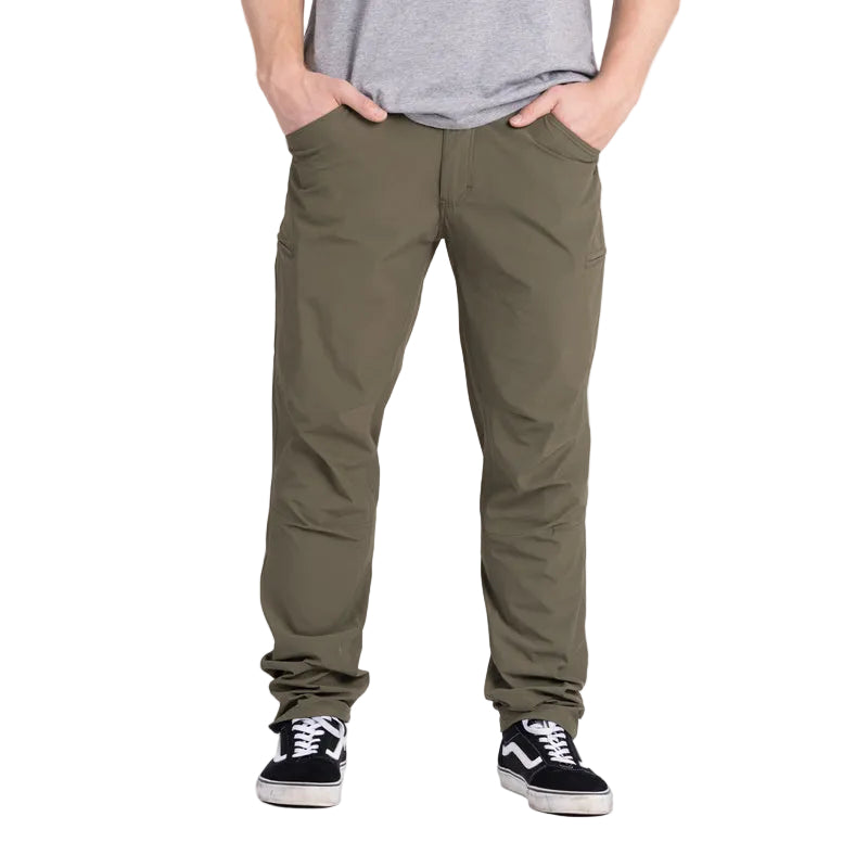 Front view of the TD Neptune Slim Pants in Ranger Green. Designed with a slim cut for a modern fit, these amphibious tactical pants feature water-repellent DWR-treated micro rip-stop nylon, 2-way stretch for mobility, and quick-dry performance. Equipped with 8 pockets, including AR mag thigh slots and pistol-mag coin pockets, these pants are perfect for tactical, outdoor, and EDC activities.