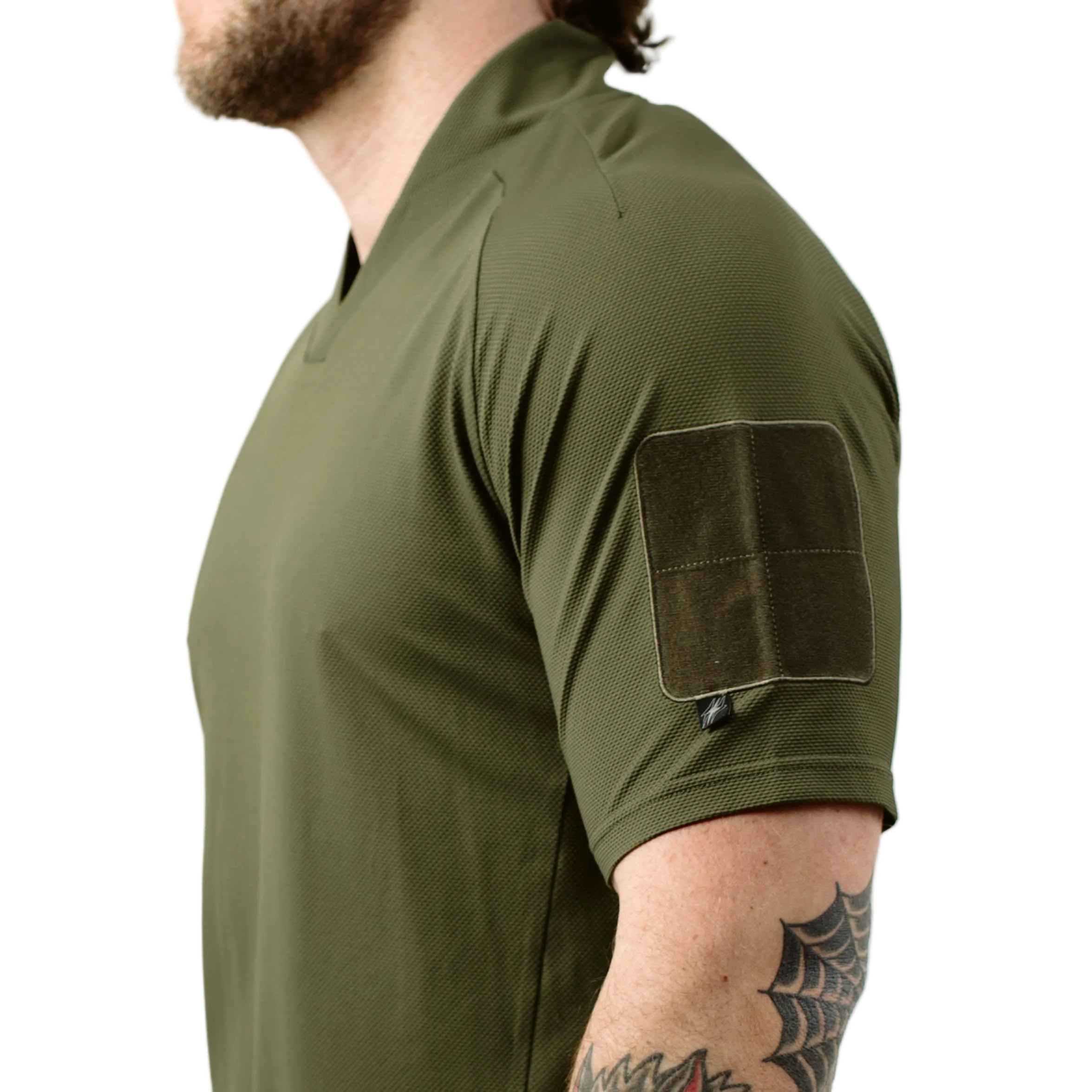 Close up of TD OSS Top Short Sleeve in Ranger Green showing low profile tricot loop patch field and articulated sleeve construction, breathable tactical operator shirt built for range training and professional field wear