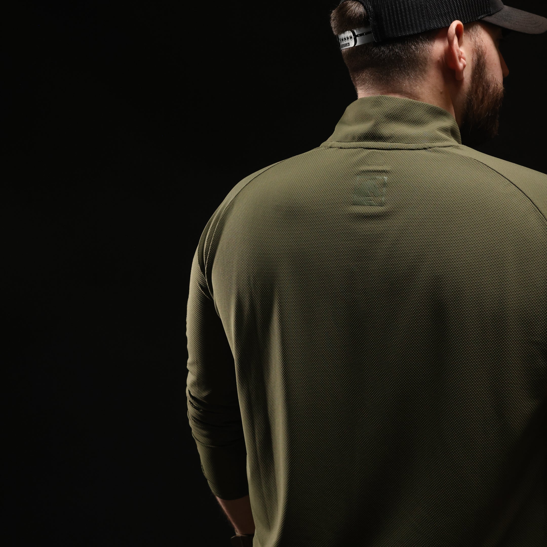 Back view of TD OSS Top V2 Long Sleeve in Ranger Green worn as part of tactical kit, lightweight combat base layer operator shirt designed for range training, law enforcement duty, and wear under plate carriers as a professional shooter top