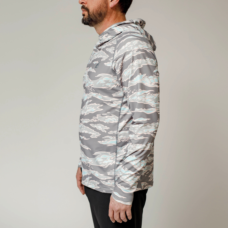 Side view of the TD Outdoor Tiger Shark Sun Shirt 3.0 in Miami Tiger Fade pattern, showcasing lightweight tactical fabric, hooded silhouette, and articulated sleeves.