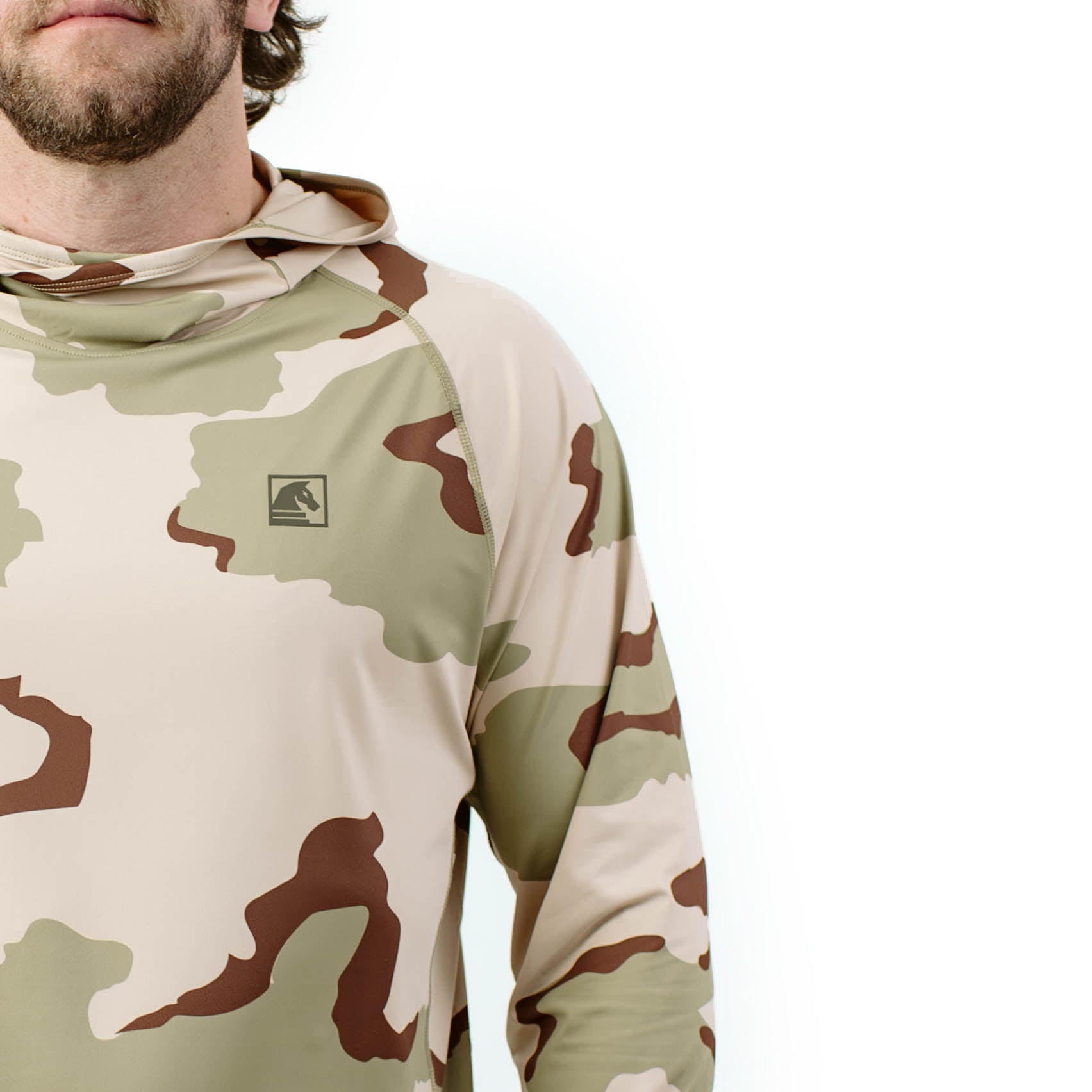 Close up of TD Outdoor Tiger Shark Sun Shirt in DCU camo showing wrapped shoulder construction, tonal seam detailing, and low visibility chest branding on lightweight UPF 50 tactical performance hoodie built for hot weather range use