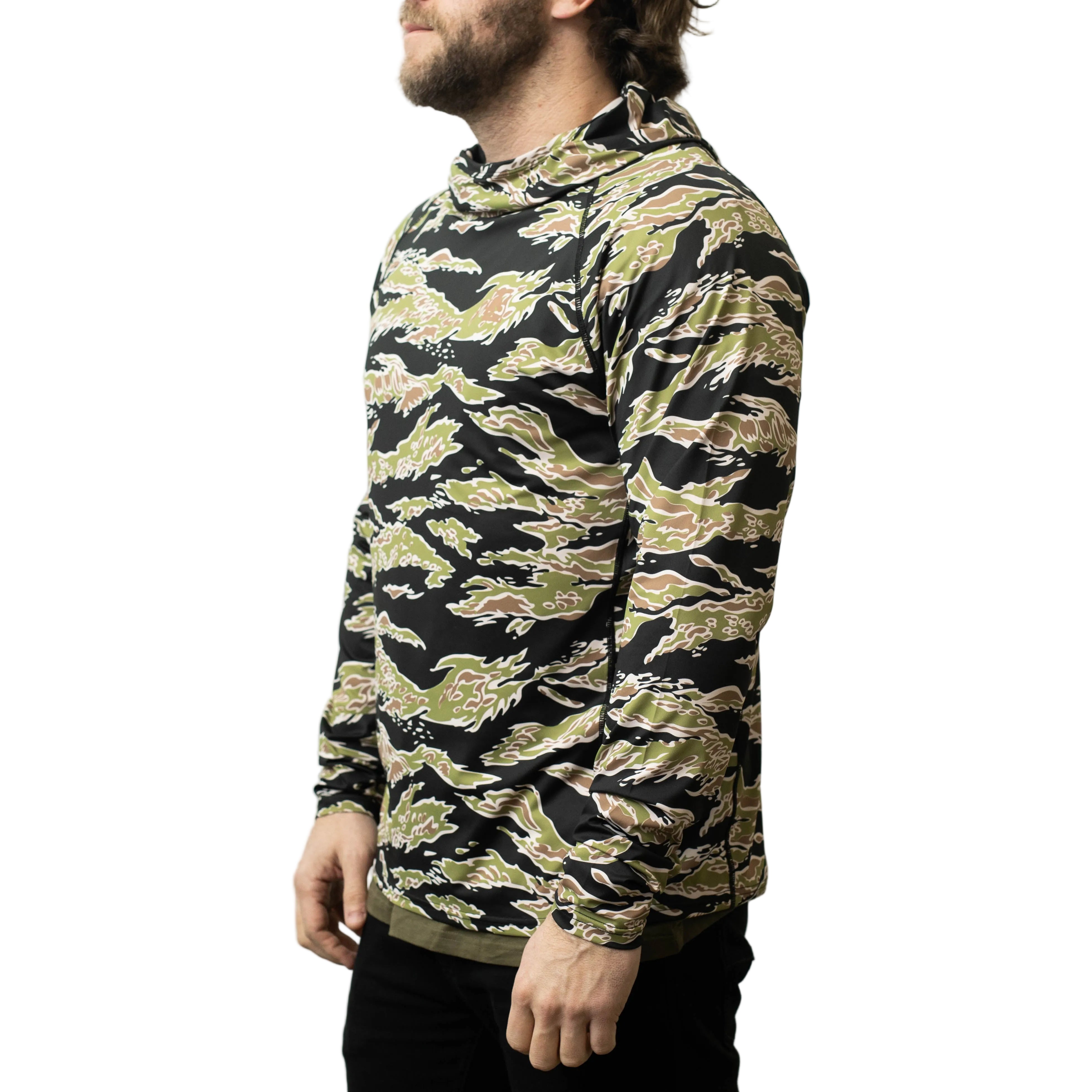 Side view of TD Outdoor Tiger Shark Sun Shirt in Golden Tiger camo highlighting athletic cut, raglan sleeve mobility, and lightweight UPF 50 sun protection fabric built for high heat range days and outdoor training