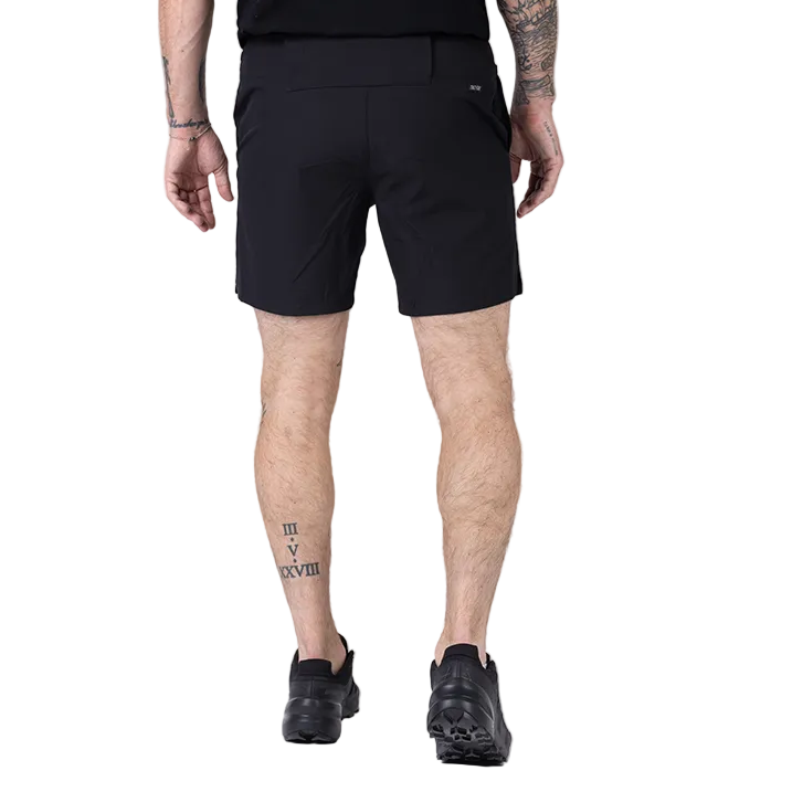 Back view of TD Workup Athletic Shorts in Black showcasing the clean tactical design with a secure performance waistband, subtle back branding, and lightweight stretch ripstop fabric. These athletic shorts provide EDC-ready pocketing and gusseted construction for unrestricted movement, making them perfect for intense training sessions, running, and tactical workouts