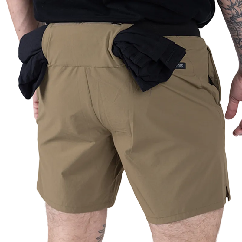Back view of TD Workup Athletic Shorts in Nile Brown demonstrating the functional zipper back pocket with integrated pull-through loop securely holding a shirt or towel during running. This tactical feature adds convenience for athletes, while the stretch ripstop fabric and stable waistband ensure comfort and mobility for high-intensity training and everyday fitness