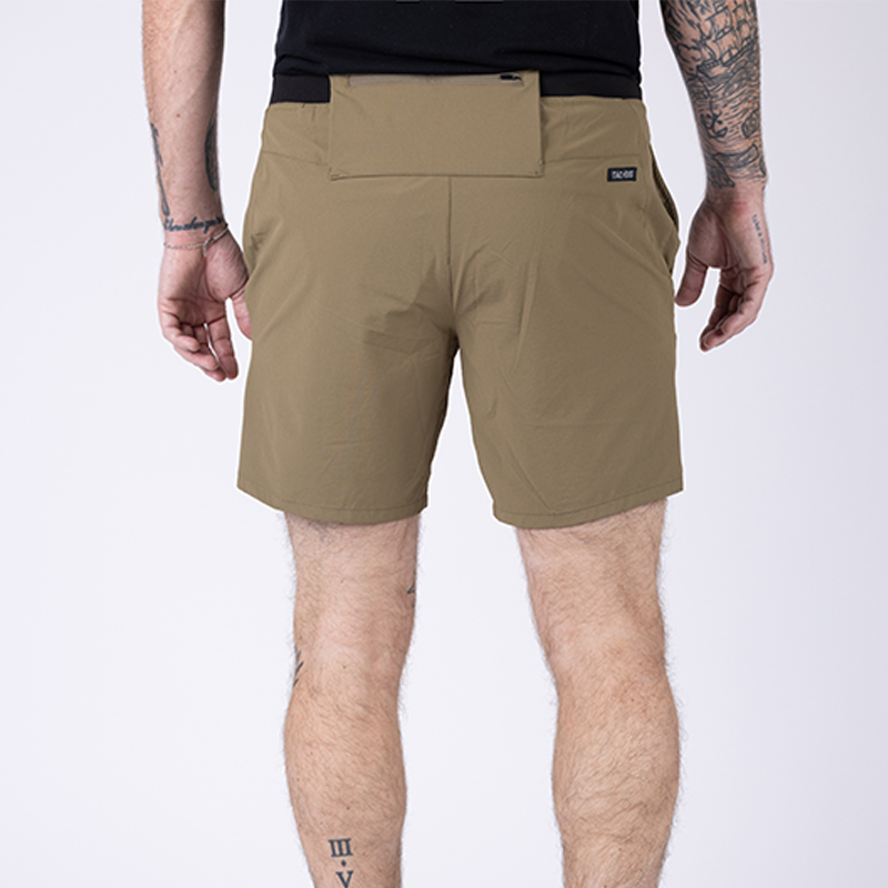 Back view of TD Workup Athletic Shorts in Nile Brown showing the secure zipper back pocket designed to hold essentials during intense training. The lightweight stretch ripstop fabric, performance waistband, and EDC-friendly storage make these tactical athletic shorts ideal for gym workouts, trail runs, and rugged fitness routines
