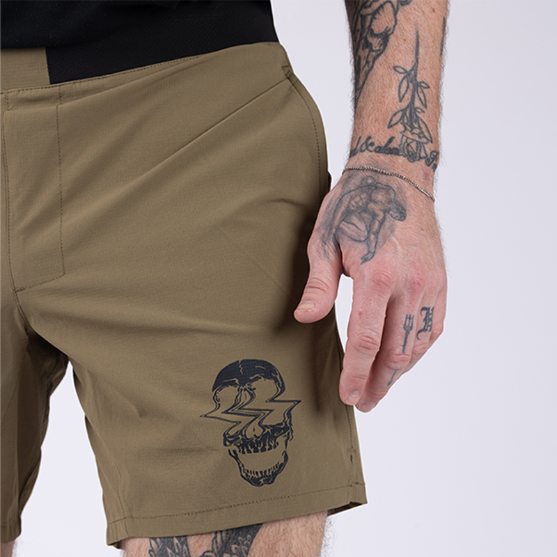 Photo of TD Workup Athletic Shorts in Nile Brown highlighting the stretchy ripstop fabric, secure EDC pockets, and gusseted front leg construction that allows maximum mobility during squats, lunges, and tactical training. These performance shorts are built for athletes who demand comfort, freedom of movement, and practical storage for running and intense workouts