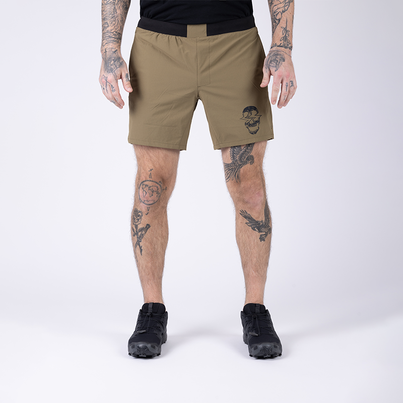 Another front view of TD Workup Athletic Shorts in Nile Brown showcasing the secure no-roll waistband and integrated EDC-ready pocketing system. Designed for tactical athletes, these lightweight ripstop shorts provide all-day comfort, moisture control, and rugged durability for intense gym sessions, trail runs, or functional fitness training