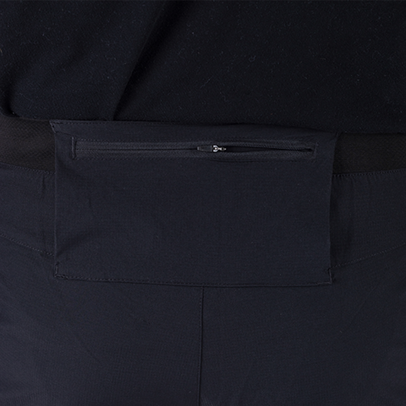 Close-up view of the TD Workup Athletic Shorts pocket showing the secure zipper back pocket designed for safe storage during workouts. This pocket detail highlights the tactical functionality and everyday convenience built into the lightweight stretch ripstop fabric, making these shorts perfect for running, training, and EDC fitness use