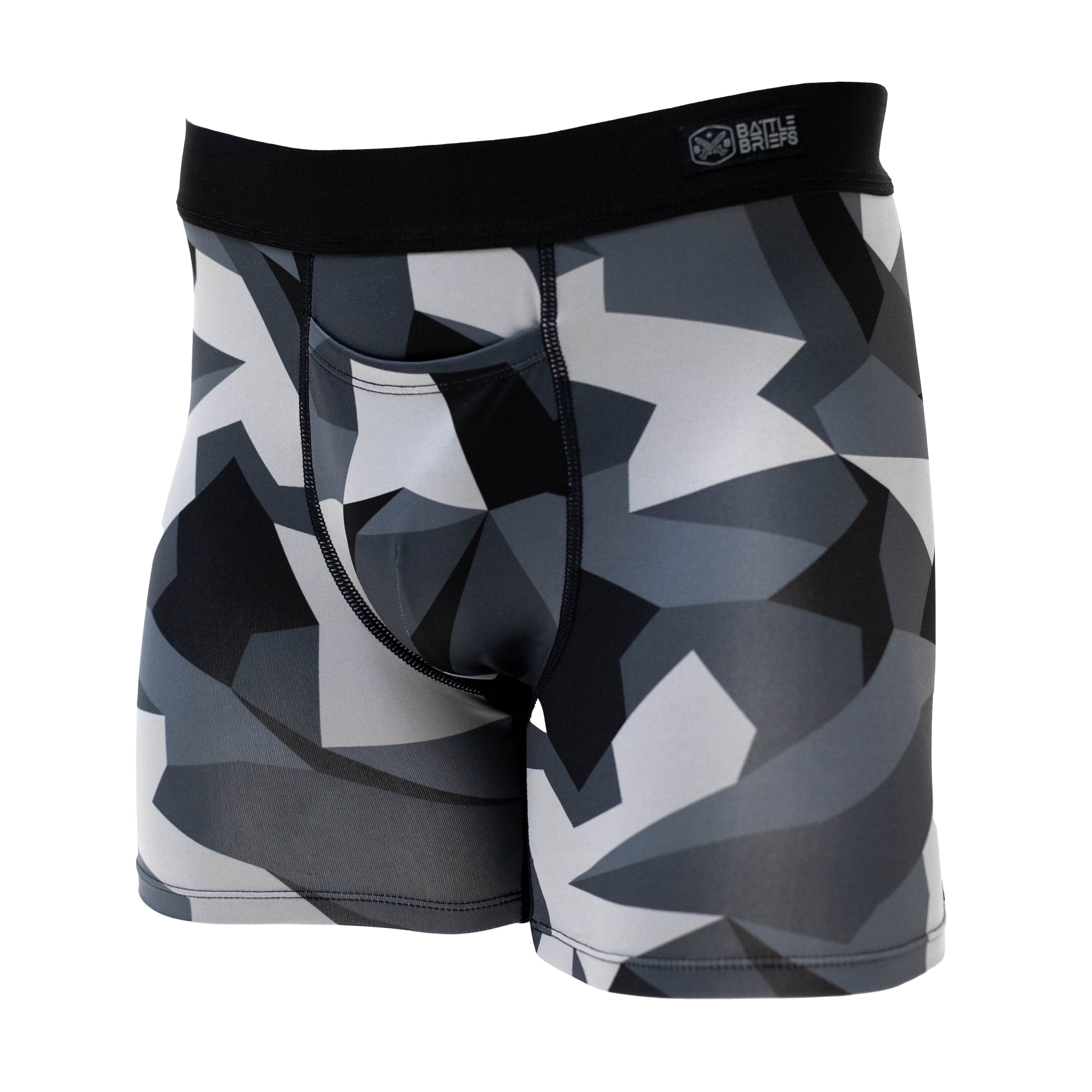 3/4 view of Battle Briefs Men’s Performance Boxer Briefs in Night M90 camo. Designed for tactical and athletic use, these boxer briefs feature moisture-wicking, quick-drying fabric, a plush elastic waistband, and anti-microbial technology for lasting comfort during intense activity.