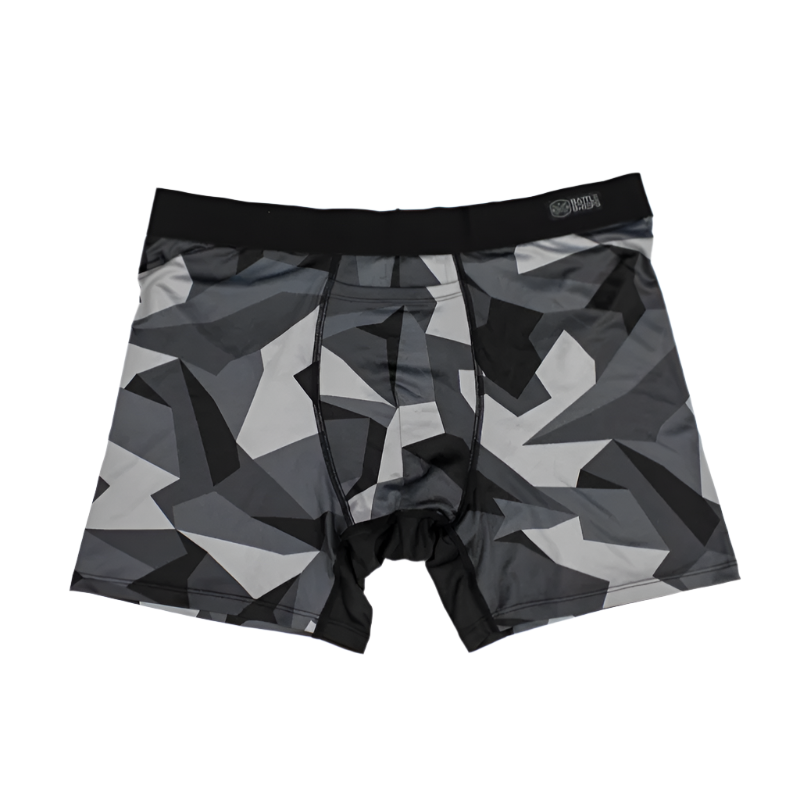 Front view of the flat lay of Battle Briefs Men’s Performance Boxer Briefs in Night M90 camo. These tactical boxer briefs feature moisture-wicking, quick-drying fabric, a plush elastic waistband, and anti-microbial technology, offering all-day comfort and support for active and tactical lifestyles.
