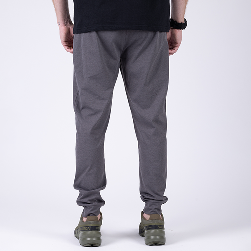 Back view of TD Tactical EDC Joggers in Gunmetal Grey showing athletic fit, streamlined design, and concealed carry-ready waistband with zippered back pocket