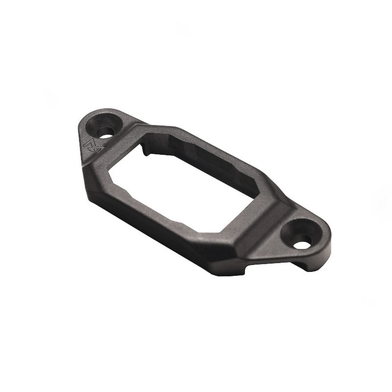 Product shot of the Unity AXON™ SL M-LOK Mounting Kit in Black — low-profile high-impact polymer frame that converts an AXON SL remote switch for direct M-LOK attachment. Ultralight (<0.5 oz), includes M-LOK screws & nuts, minimalist remote switch mount for tactical rifles and modern handguards. (AXON SL switch not included.)