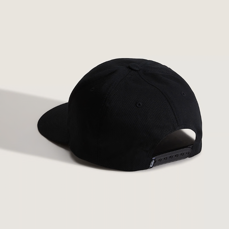 Black cap on a light beige background
