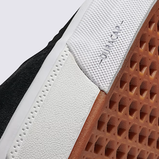 Close-up of DURACAP™ reinforcement on the Vans BMX Sk8-Hi, highlighting added durability in high-wear zones for extended life during intense movement