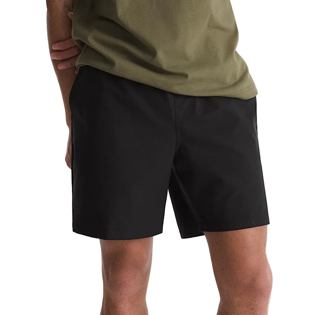 Model wearing Vans Range Sport Shorts in Black with a comfortable athletic fit and lightweight performance fabric.