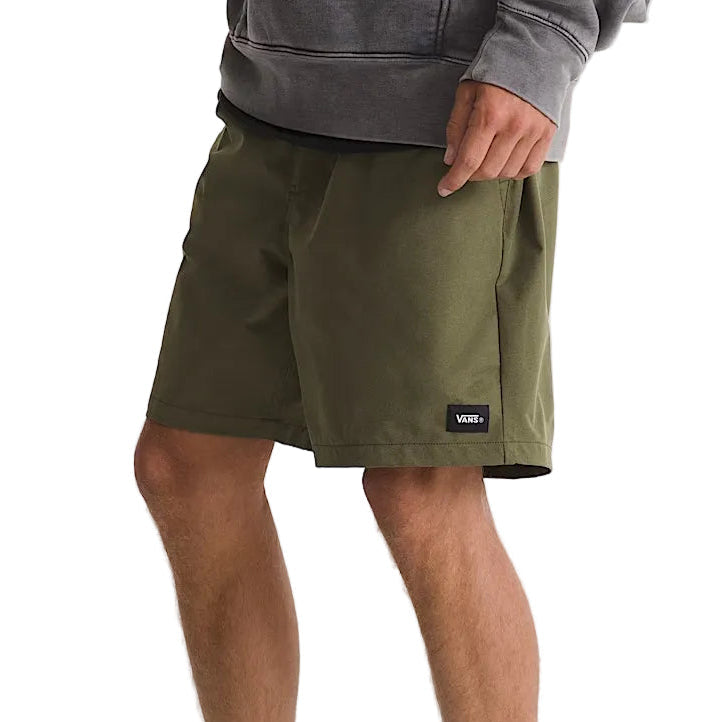 Side profile of Vans Range Sport Shorts in Mossy Olive featuring stretch fabric and a relaxed athletic fit for unrestricted movement.