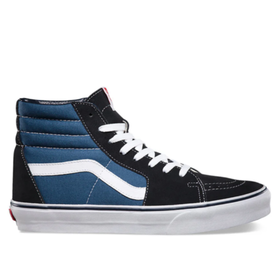 Side profile of the Vans Sk8-Hi in navy and blue suede and canvas with white Sidestripe. Iconic high-top skate shoe featuring reinforced toe cap, padded collar for ankle support, lace-up closure, and Vans’ signature waffle outsole for grip and durability.