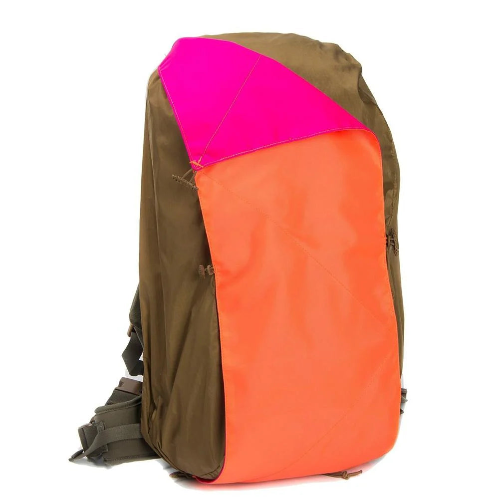 Velocity Systems VS17 signal panel mounted on backpack for high visibility identification in tactical field use
