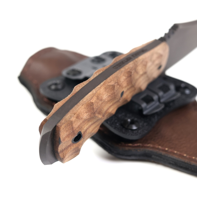 Close up of contoured walnut handle scales on Winkler Blue Ridge Crusher fixed blade highlighting ergonomic grip design