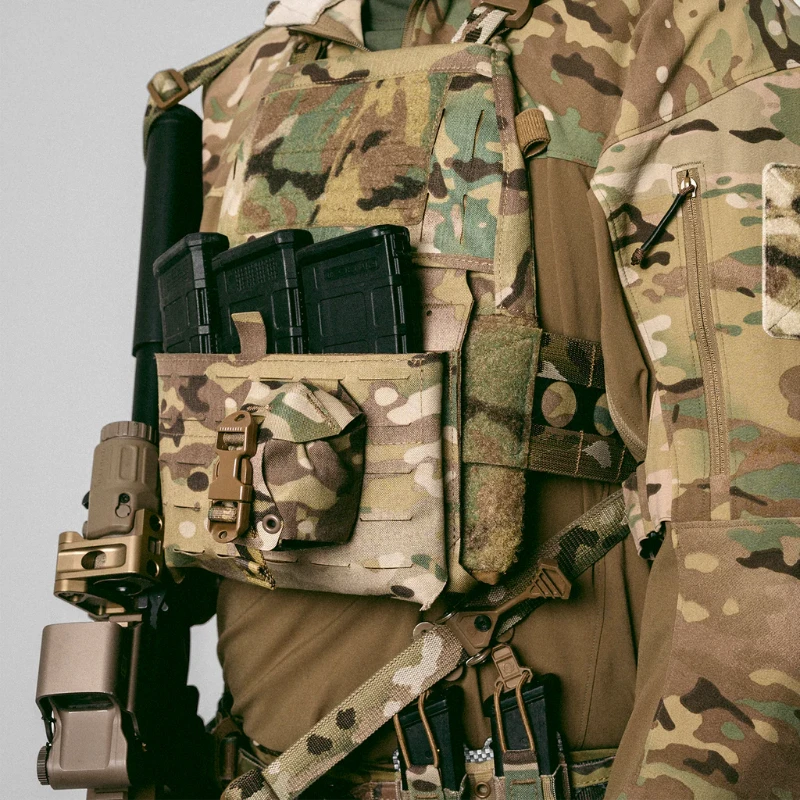 Operator wearing full tactical loadout with Frag Bag™ pouch mounted on Multicam belt rig in live deployment stance