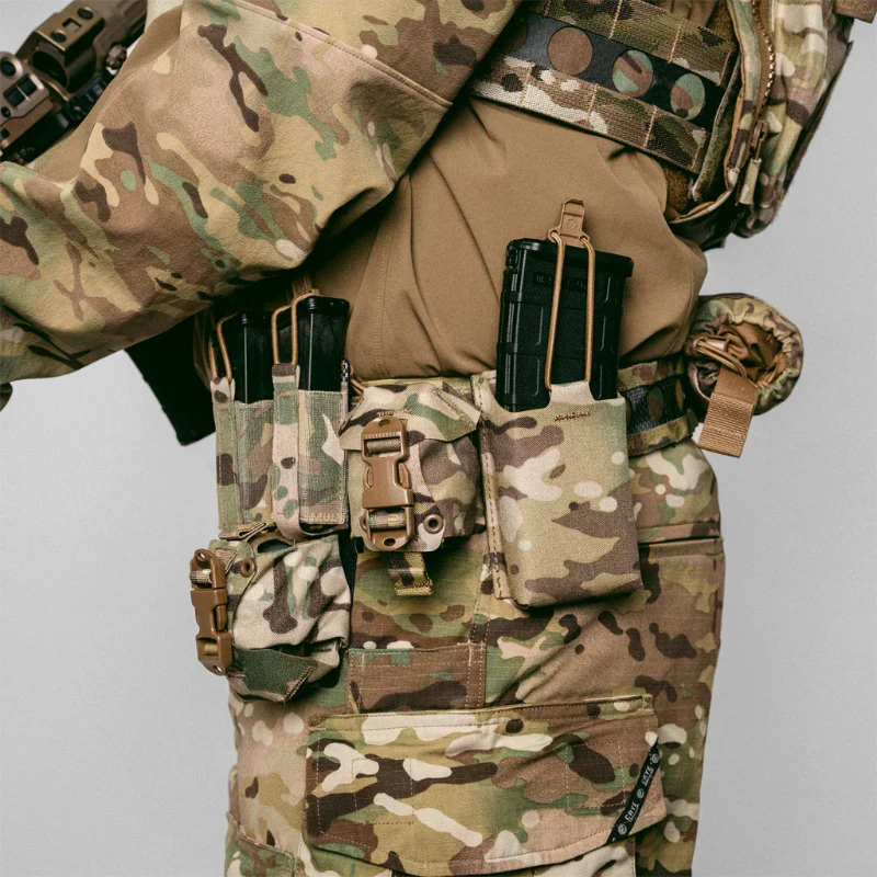 Operator wearing full tactical loadout with Frag Bag™ pouch mounted on Multicam belt rig in live deployment stance