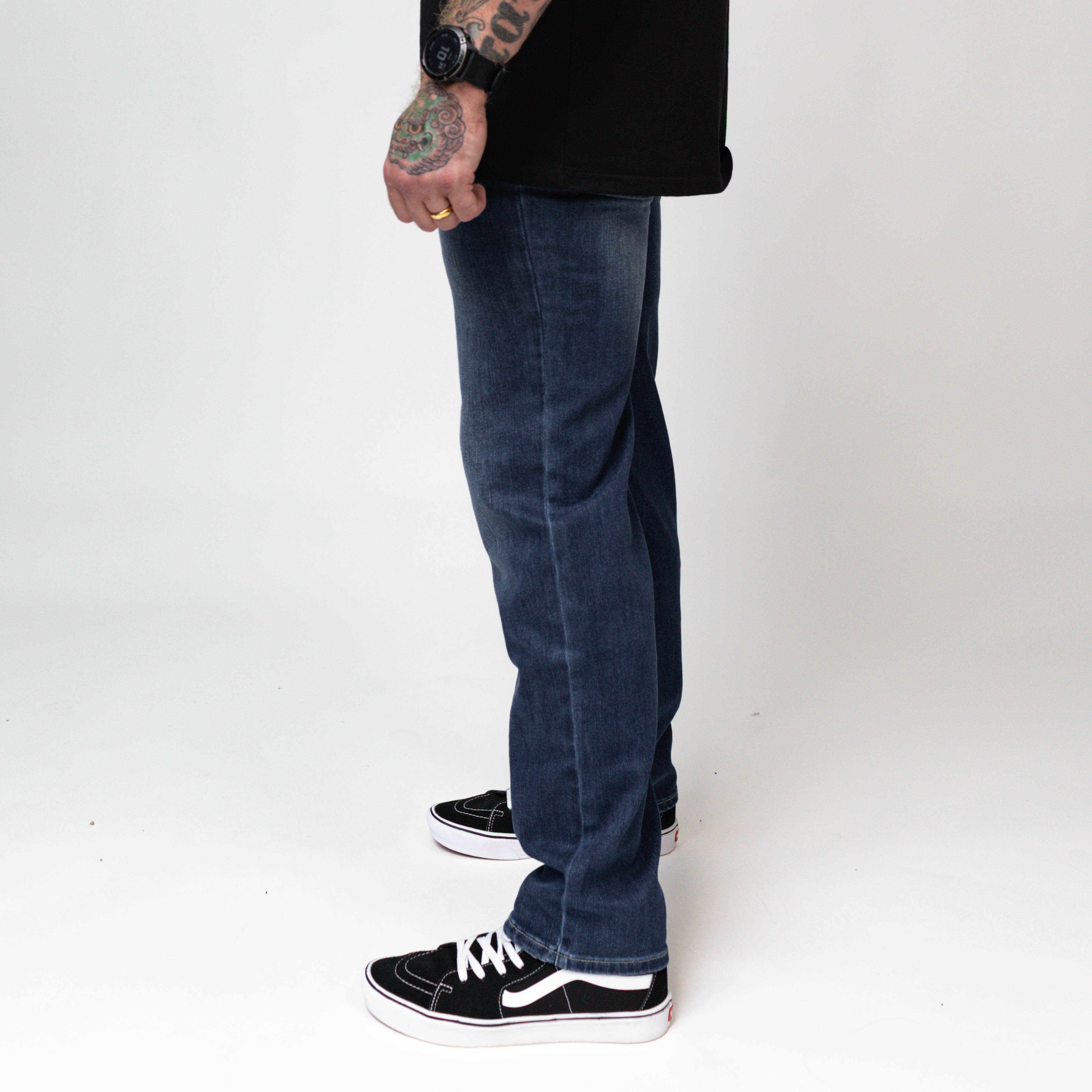 On body view of the TD McQuade Tactical Jeans in the Marlboro wash regular cut showing the stretch tactical denim fit, concealed carry friendly waistband, ten pocket EDC layout, and reinforced construction optimized for buyers searching for the best tactical jeans, CCW jeans, and everyday carry pants.