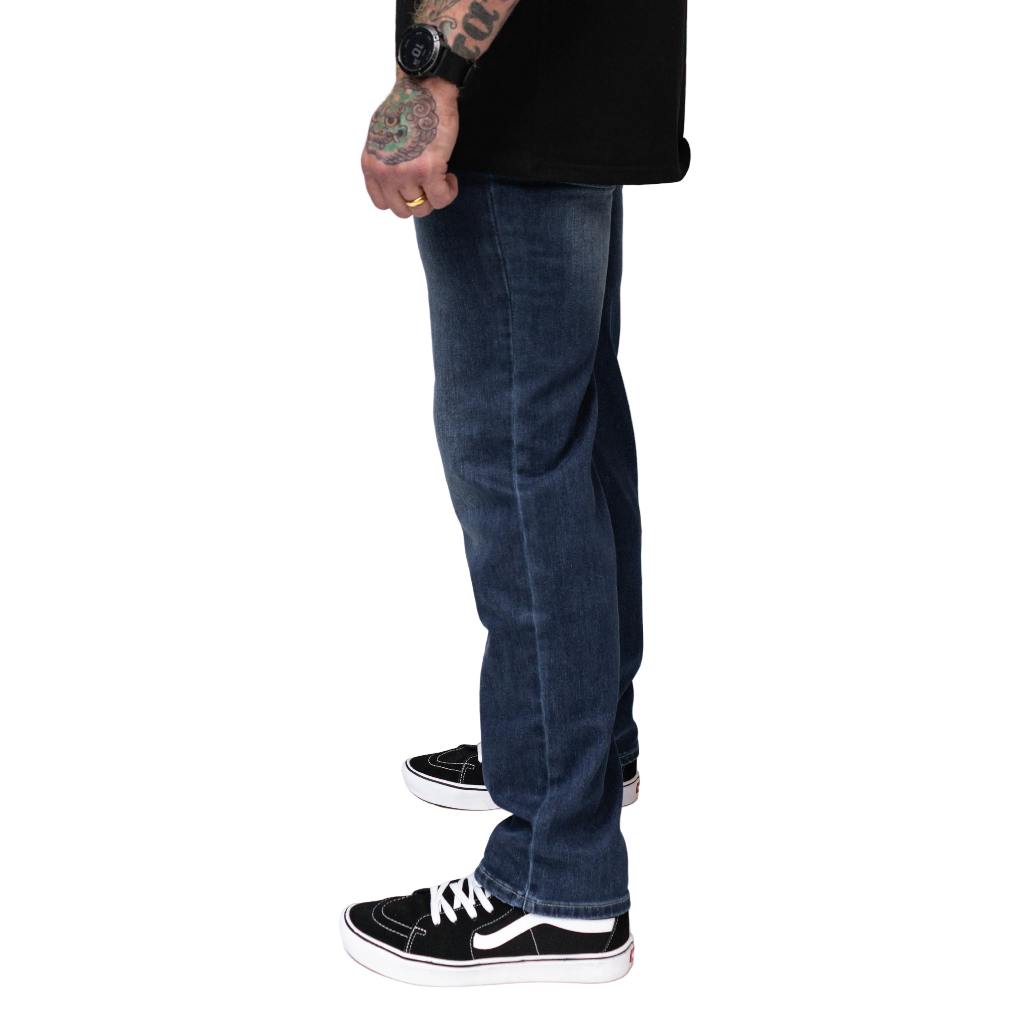 On body view of the TD McQuade Tactical Jeans in the Marlboro wash regular cut showing the stretch tactical denim fit, concealed carry friendly waistband, ten pocket EDC layout, and reinforced construction optimized for buyers searching for the best tactical jeans, CCW jeans, and everyday carry pants.