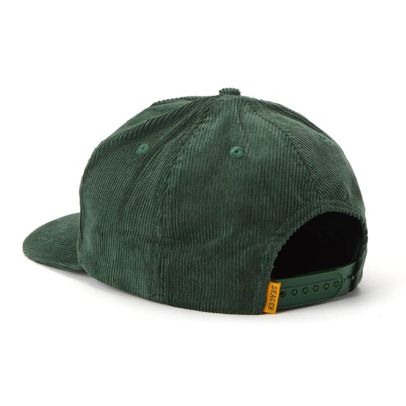 Green corduroy cap with a brand logo on a white background