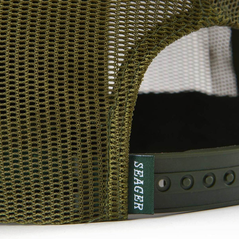 Close-up of a green mesh cap with a Seager logo on a white background