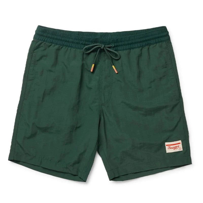 Green shorts with a Seager brand label on a white background