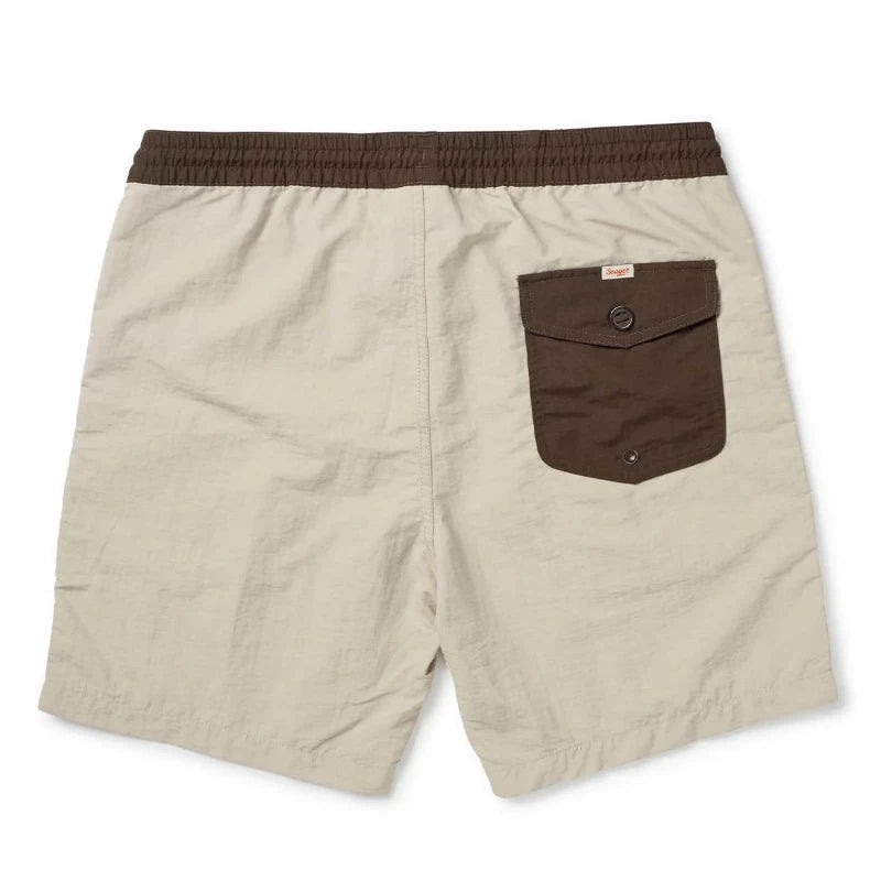 Beige shorts with a brown pocket and waistband on a white background