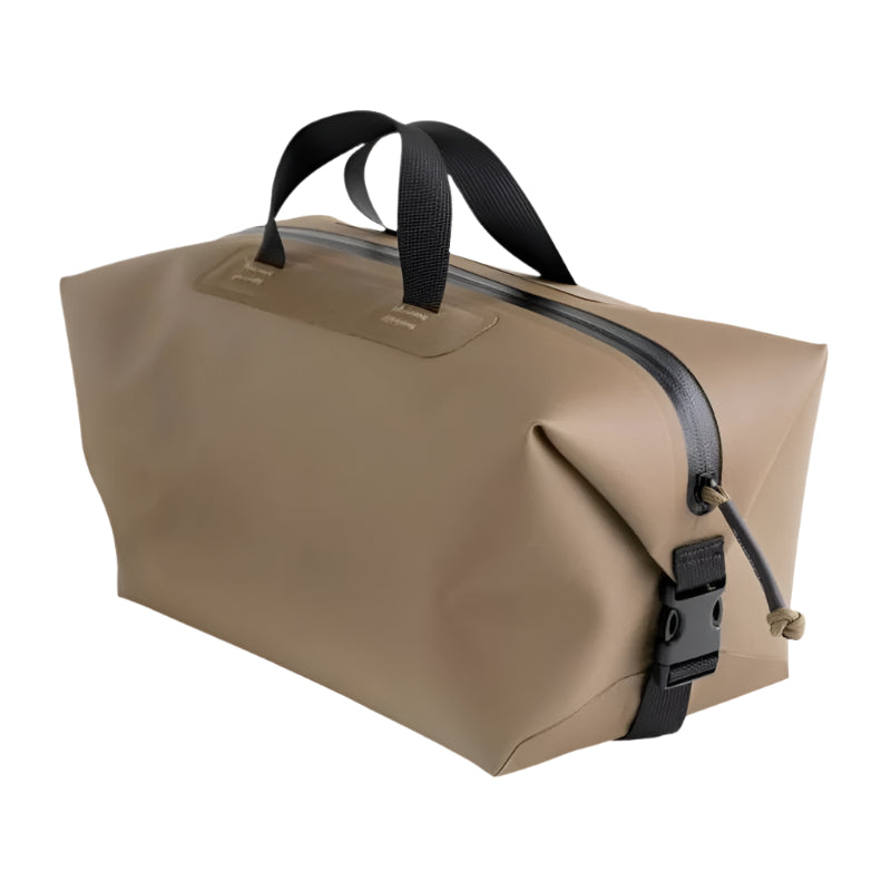 Magpul DAKA Takeout Large Bag in Flat Dark Earth (FDE) | 8.88L rugged storage bag with polymer-infused fabric, RF-welded seams, and water-resistant YKK zipper for field-ready durability.