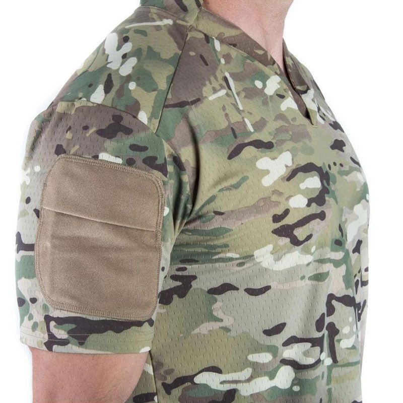Detail view of the Velocity Systems BOSS Rugby Short Sleeve Combat Shirt in MultiCam, showing sleeve pocket and loop panel design. Built from 4-way stretch nylon-spandex with UV protection and antimicrobial tech for tactical range and field operations.
