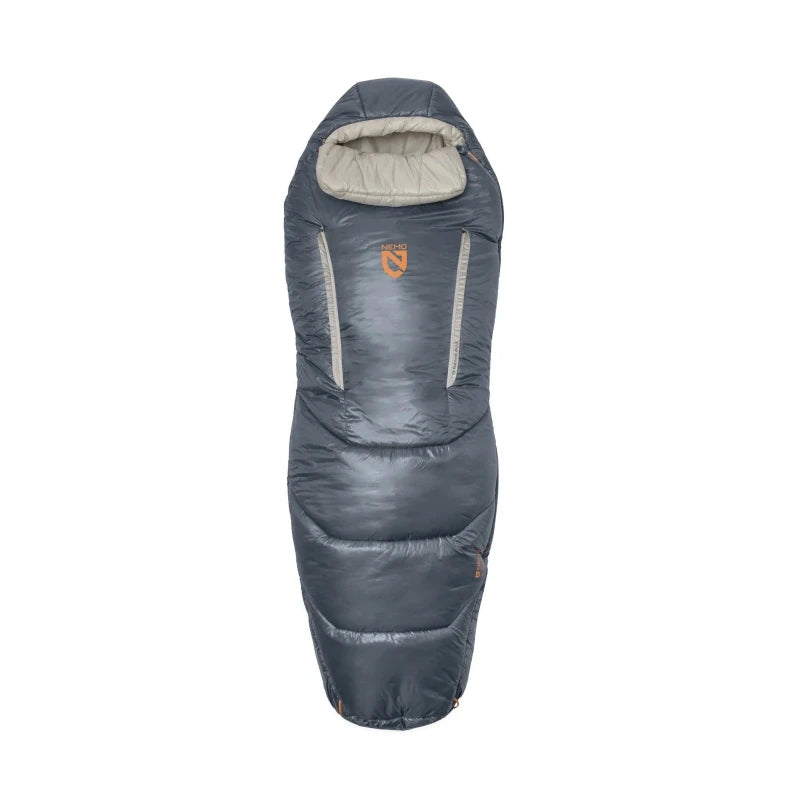 A dark gray mummy-style sleeping bag with a light beige hood lining and a small orange NEMO logo on the front, shown against a plain white background.