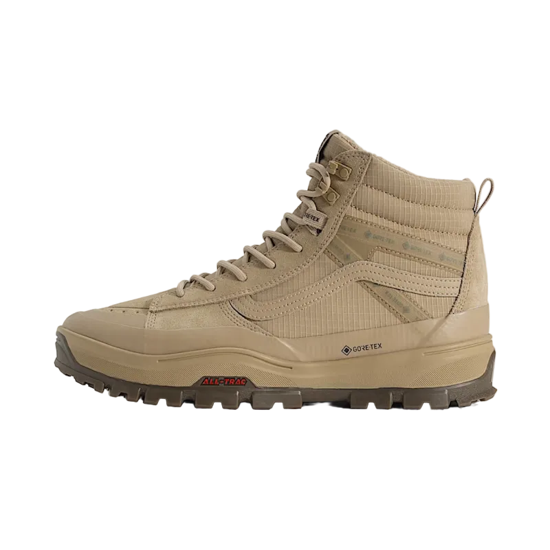 Tan hiking boot with Gore-Tex branding on a light beige background