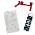 Spray paint can, target practice card, and red stand on a white background