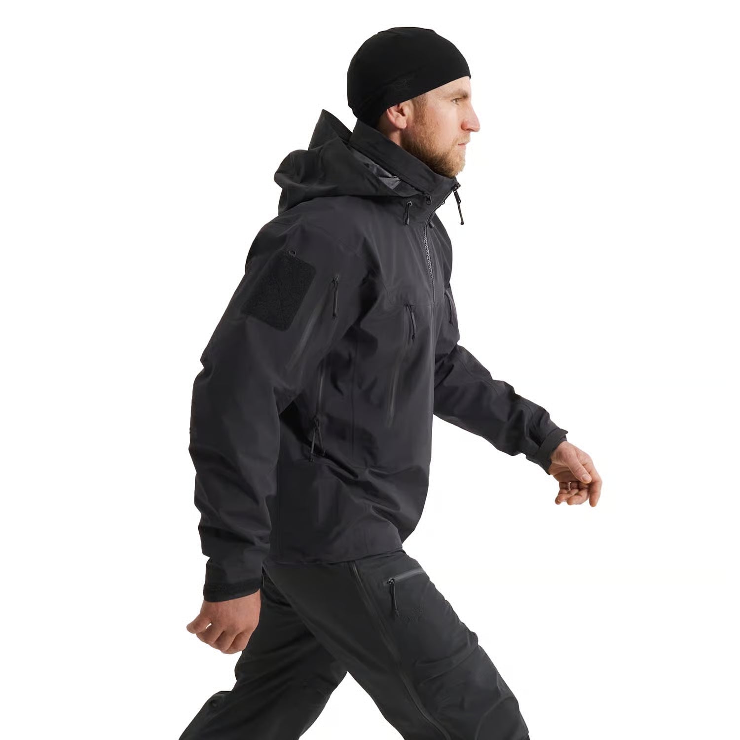 Side profile of Arc'teryx PRO Alpha Jacket GEN 2.3 showing streamlined tactical shell design and military cut