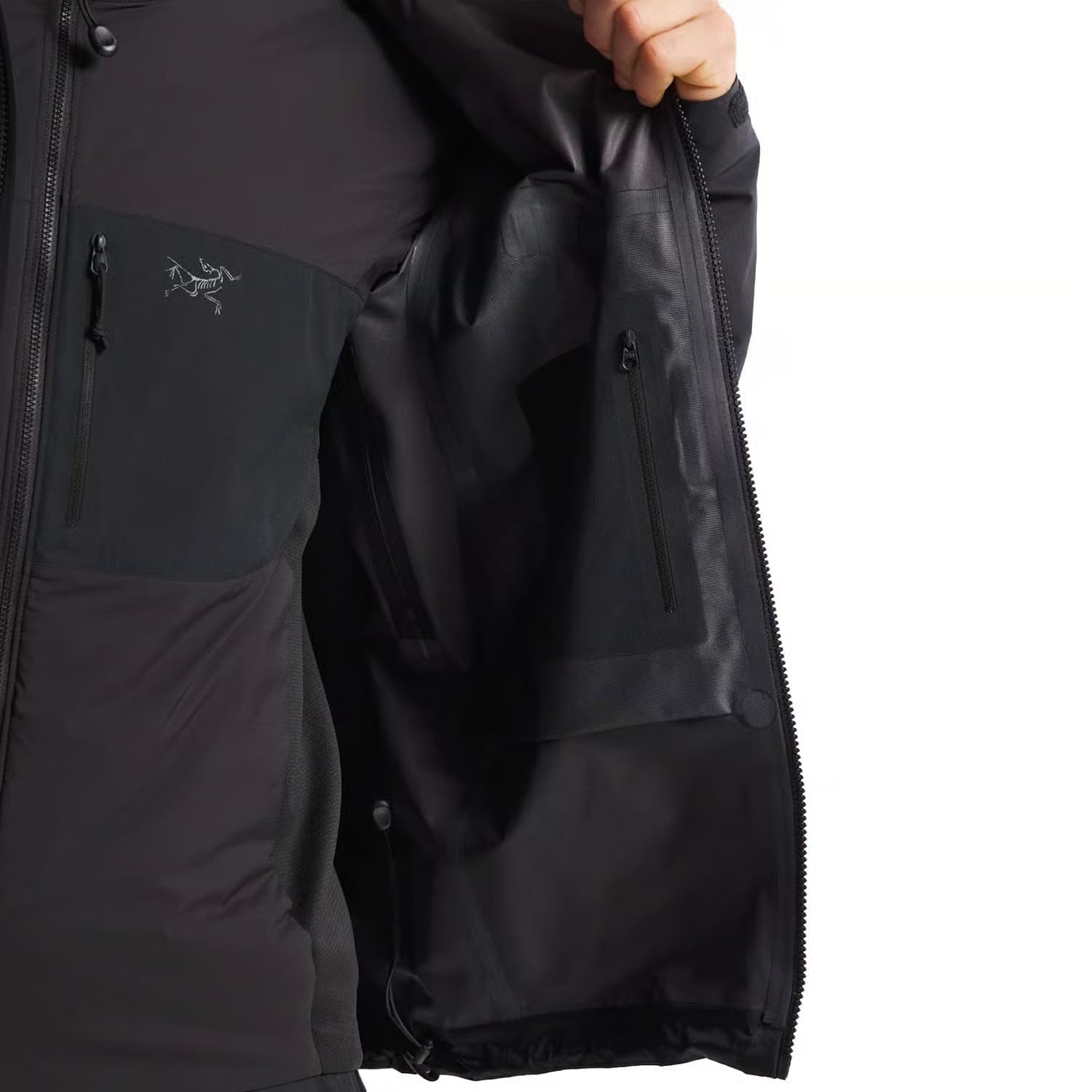 Internal zip security pocket on Arc'teryx PRO Alpha Jacket GEN 2.3 using recycled material construction