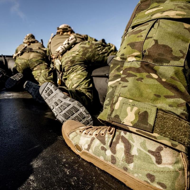 Close-up of Altama Maritime Assault Boot – Low worn on mission inside a boat | Fin-compatible tactical footwear with quick-dry Cordura®, drain ports, and rugged traction -  the best shoes for maritime operations.