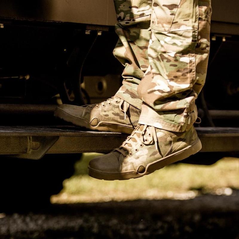 Altama Maritime Assault Boot Low worn in tactical outdoor environment | Lightweight quick dry footwear with Cordura panels, drain ports, and rugged traction built for maritime and amphibious missions.