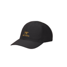 Arc'teryx Bird Word Cap in 24K Black featuring lightweight black fabric, a curved brim, and gold Arc'teryx Bird and Word logos on the front.