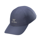 A navy blue Arc'teryx baseball cap with a curved brim, featuring the brand's logo and name embroidered in light beige on the front panel, set against a plain white background.