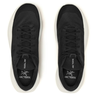 Black sneakers with white soles on a white background, featuring the Arc'teryx logo.