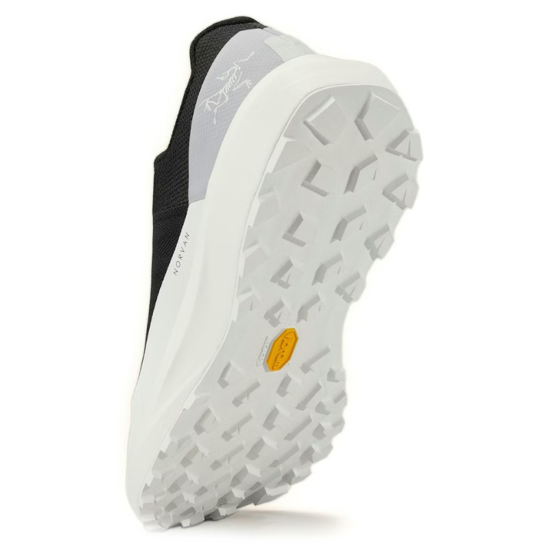 Close-up of a shoe sole with a textured pattern on a white background