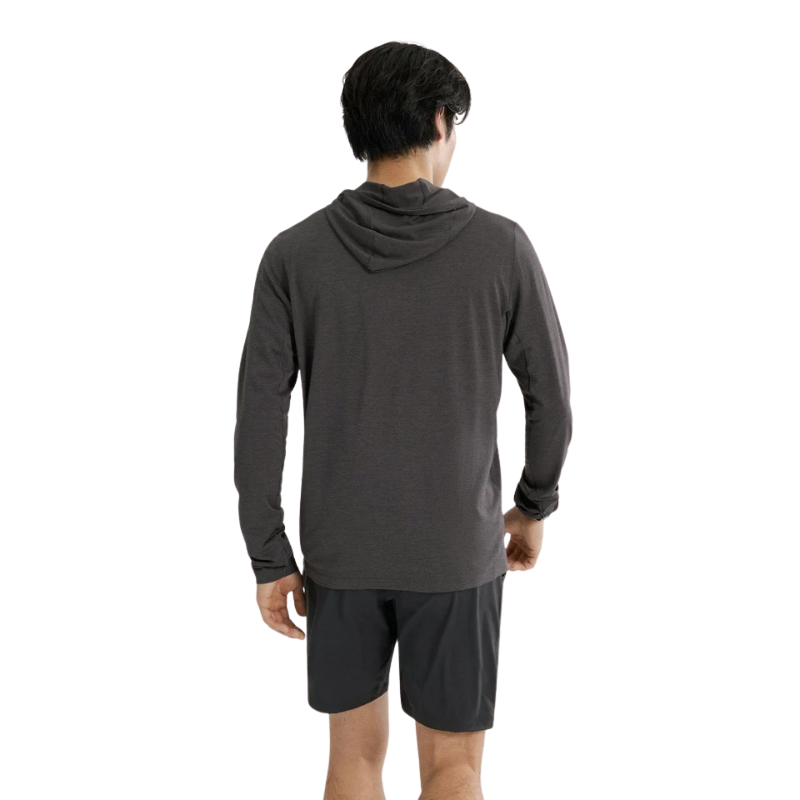 Arc'teryx Cormac Hoody in dark grey shown from the back on a male model, featuring a lightweight long-sleeve design and low-profile hood.
