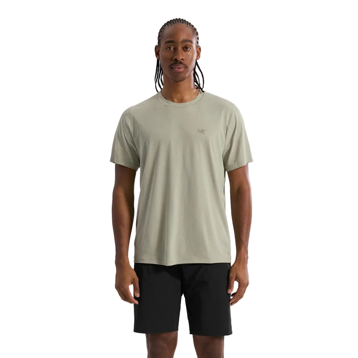 Arc'teryx Cormac Crew Neck Shirt in Habitat green worn during trail run showing breathable recycled polyester fabric designed for hot weather hiking, mountain training, and high output outdoor movement