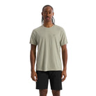 Arc'teryx Cormac Crew Neck Shirt in Habitat green worn during trail run showing breathable recycled polyester fabric designed for hot weather hiking, mountain training, and high output outdoor movement